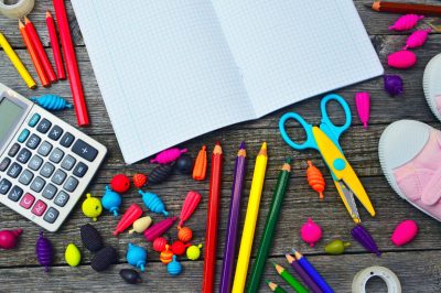 Elementary aged school supplies on tabletop