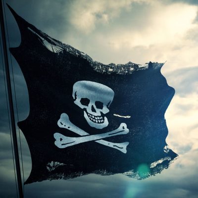 Tattered skull and crossbones pirate flag