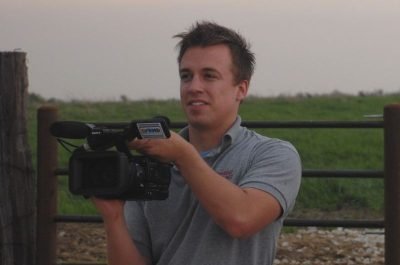 Reed Timmer holds camera.