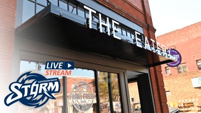 Exterior of The Eatery restaurant. Storm Athletics logo. Text reads: "Live Stream"