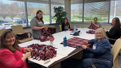 Fleece blankets made by a 15-person team will be distributed to a variety of agencies.