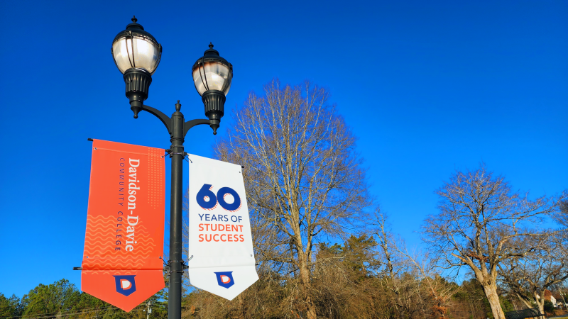 60 Years of Student Success Banner on light post at Davidson-Davie Community College