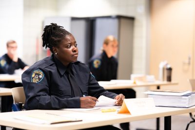 Basic Law Enforcement Training Student in Uniform at Desk