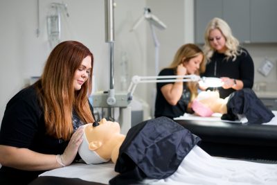 Esthetics students and instructor
