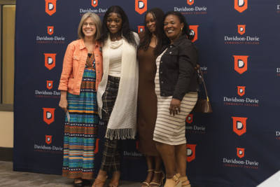 Davidson-Davie Community College National Adult Education Honor Society members and staff pose for a photo.